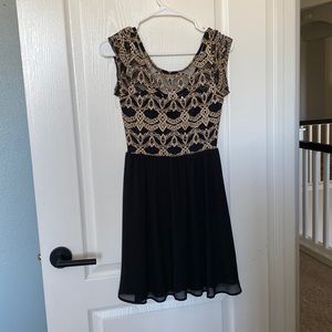 Black and gold dress